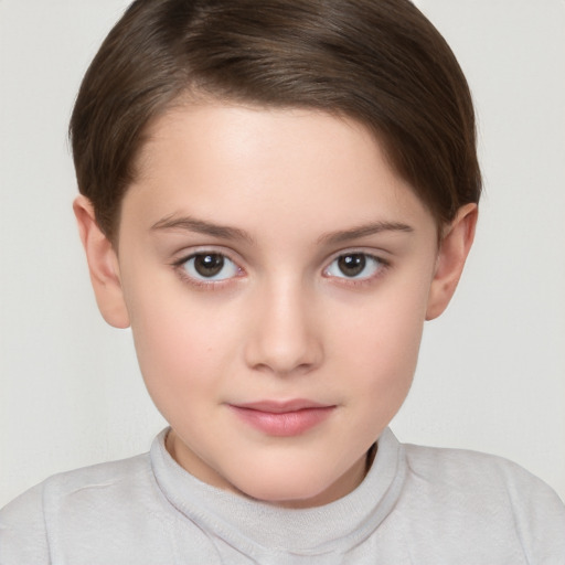 Joyful white child female with short  brown hair and brown eyes