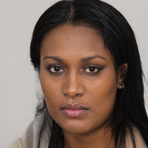 Neutral black young-adult female with long  black hair and brown eyes