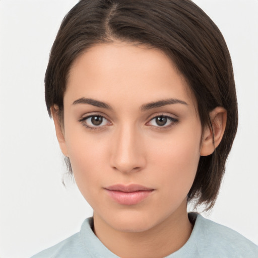 Neutral white young-adult female with medium  brown hair and brown eyes