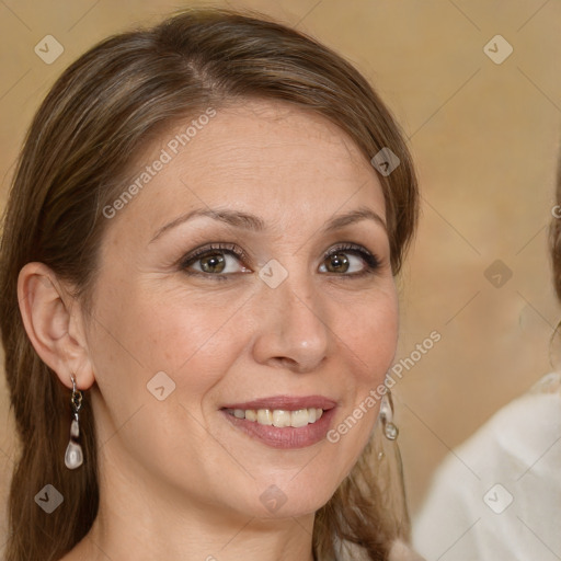 Joyful white adult female with medium  brown hair and blue eyes