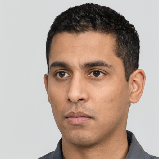 Neutral white young-adult male with short  black hair and brown eyes