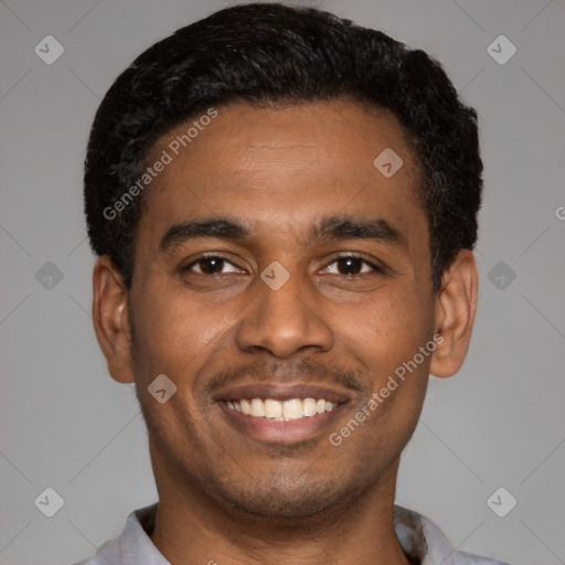 Joyful latino young-adult male with short  black hair and brown eyes