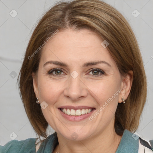 Joyful white adult female with medium  brown hair and grey eyes