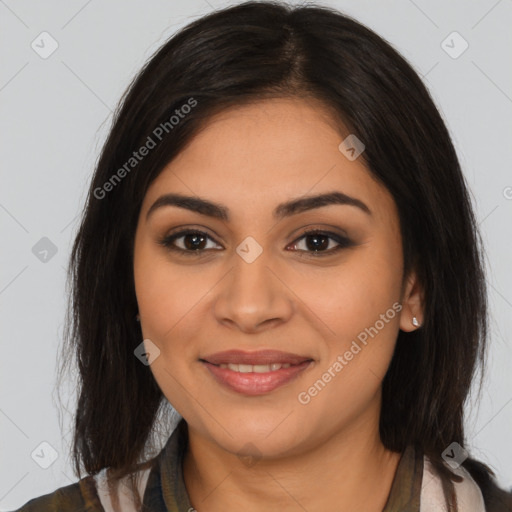 Joyful latino young-adult female with long  brown hair and brown eyes