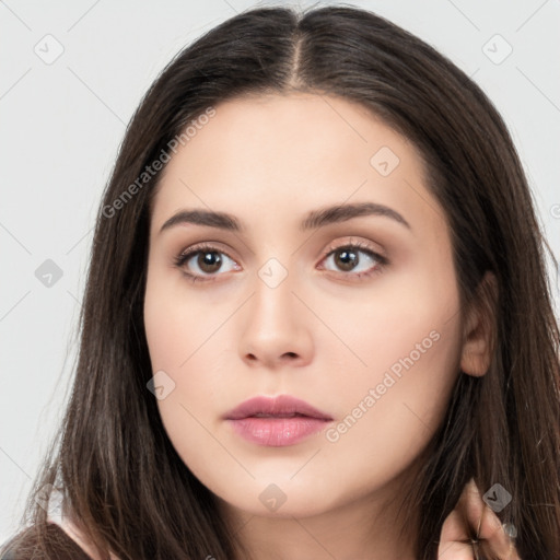 Neutral white young-adult female with long  brown hair and brown eyes