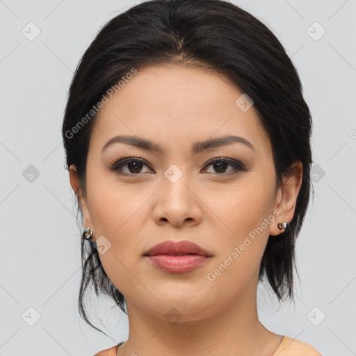 Joyful asian young-adult female with medium  brown hair and brown eyes