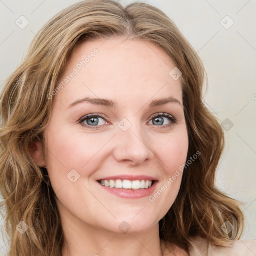 Joyful white young-adult female with medium  brown hair and green eyes