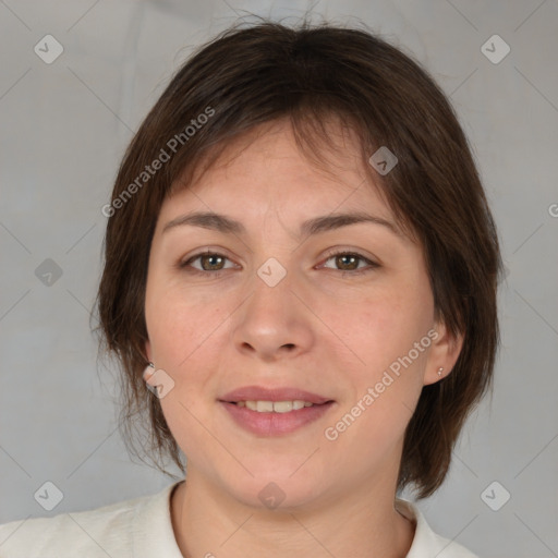 Joyful white adult female with medium  brown hair and brown eyes