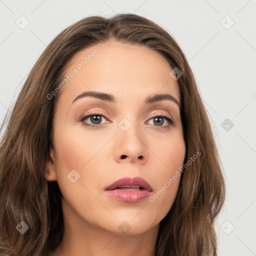 Neutral white young-adult female with long  brown hair and brown eyes