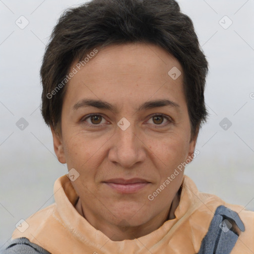 Joyful white adult female with short  brown hair and brown eyes