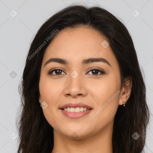 Joyful latino young-adult female with long  brown hair and brown eyes