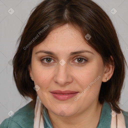 Joyful white adult female with medium  brown hair and brown eyes