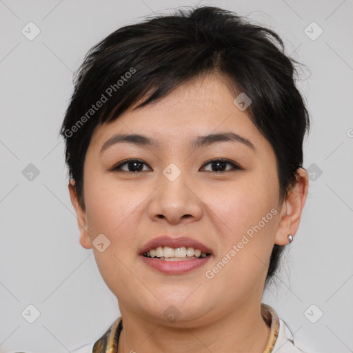 Joyful asian young-adult female with short  brown hair and brown eyes