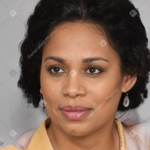 Joyful latino adult female with medium  brown hair and brown eyes