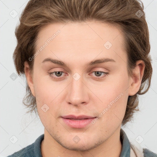 Joyful white young-adult male with medium  brown hair and grey eyes