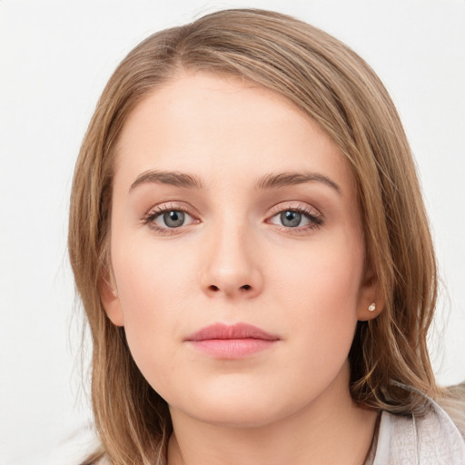 Neutral white young-adult female with long  brown hair and grey eyes