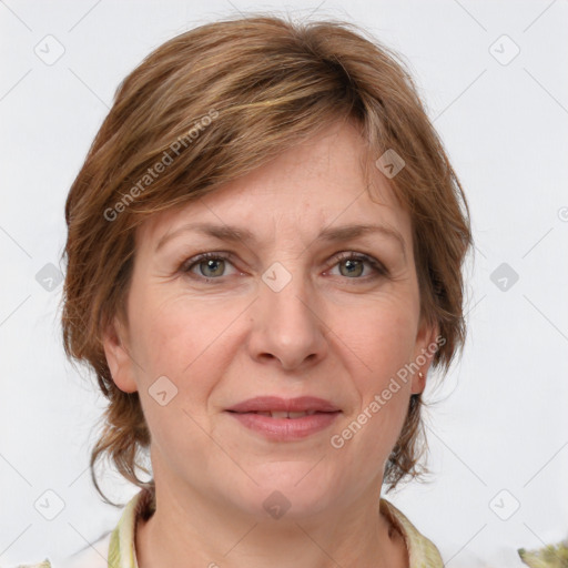 Joyful white adult female with medium  brown hair and grey eyes