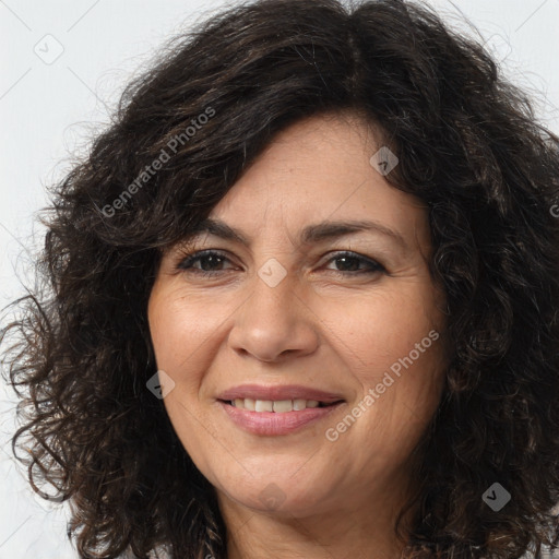 Joyful white adult female with long  brown hair and brown eyes