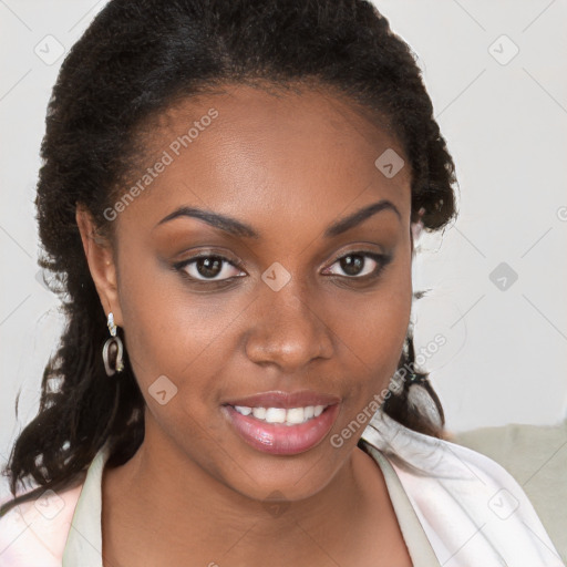 Joyful black young-adult female with long  brown hair and brown eyes