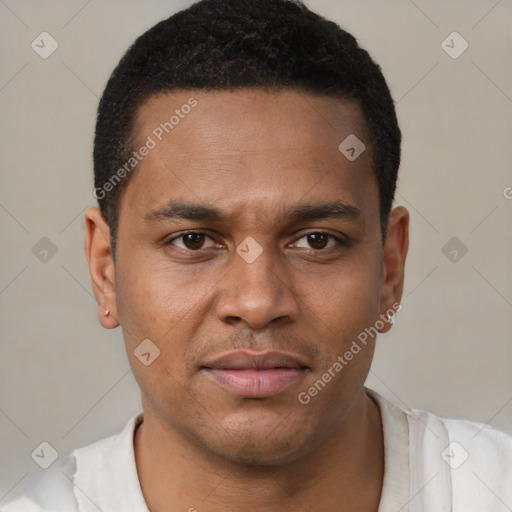 Joyful latino young-adult male with short  brown hair and brown eyes