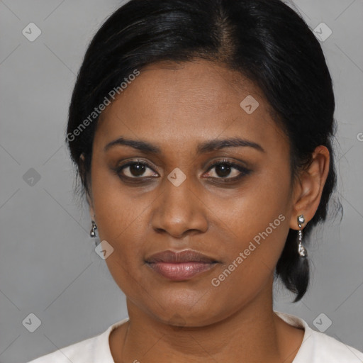 Joyful black young-adult female with medium  brown hair and brown eyes