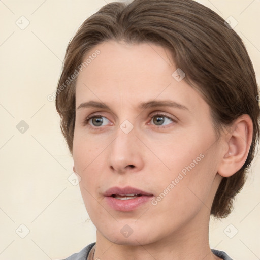 Neutral white young-adult female with medium  brown hair and grey eyes