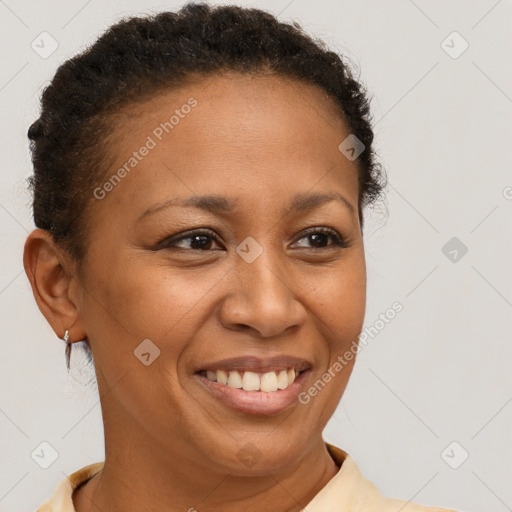 Joyful latino young-adult female with short  brown hair and brown eyes