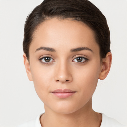 Neutral white young-adult female with short  brown hair and brown eyes