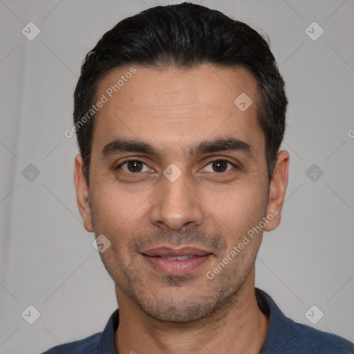 Joyful white young-adult male with short  black hair and brown eyes