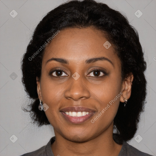 Joyful black young-adult female with medium  black hair and brown eyes