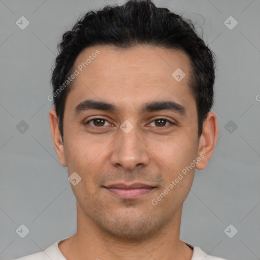 Joyful white young-adult male with short  black hair and brown eyes