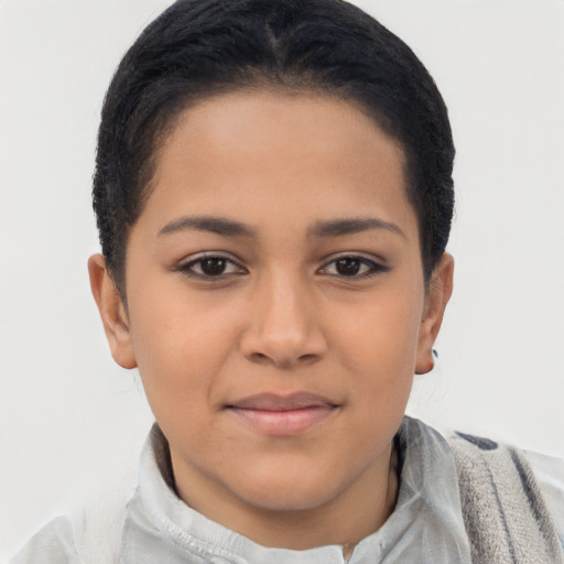 Joyful latino young-adult female with short  black hair and brown eyes