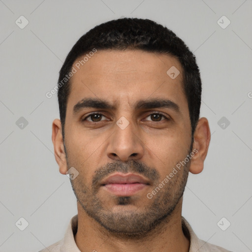 Neutral latino young-adult male with short  black hair and brown eyes