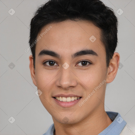 Joyful latino young-adult male with short  black hair and brown eyes