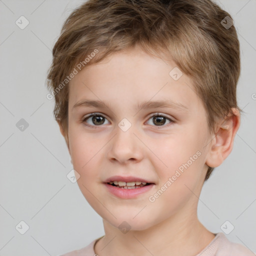 Joyful white child male with short  brown hair and brown eyes