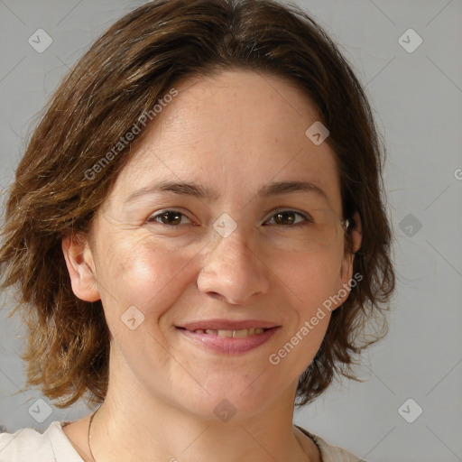 Joyful white adult female with medium  brown hair and brown eyes