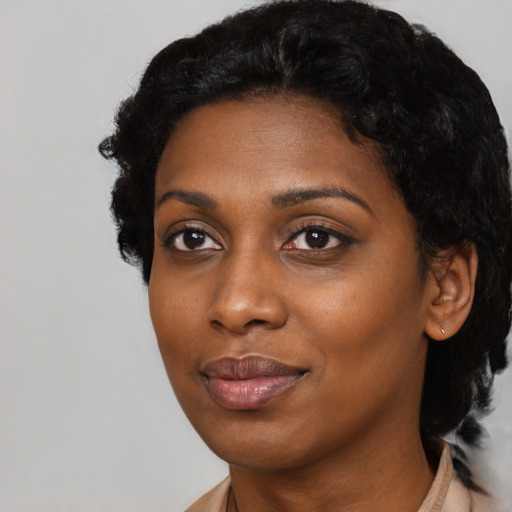 Neutral black young-adult female with long  black hair and brown eyes