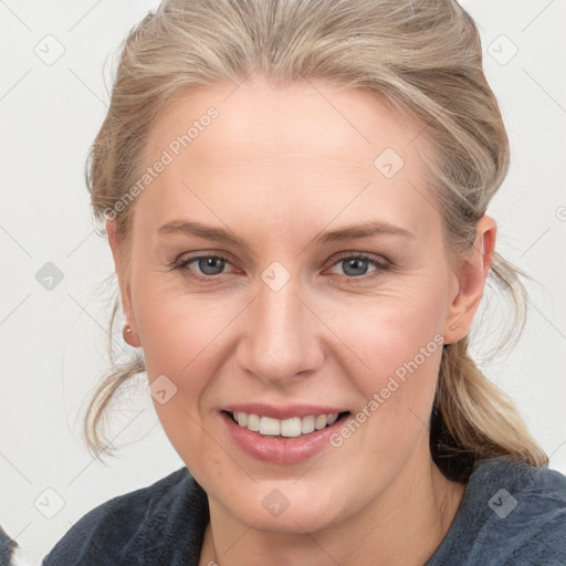 Joyful white young-adult female with medium  brown hair and blue eyes