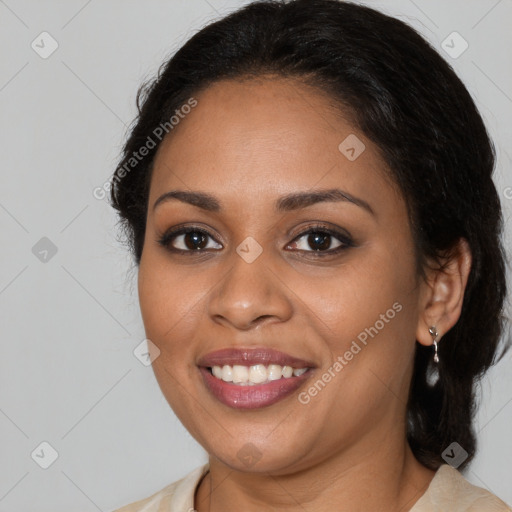 Joyful latino young-adult female with long  brown hair and brown eyes