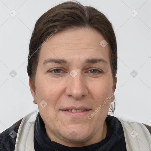 Joyful white adult female with short  brown hair and brown eyes