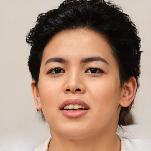 Joyful asian young-adult female with short  black hair and brown eyes