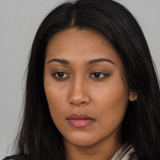Neutral asian young-adult female with long  brown hair and brown eyes
