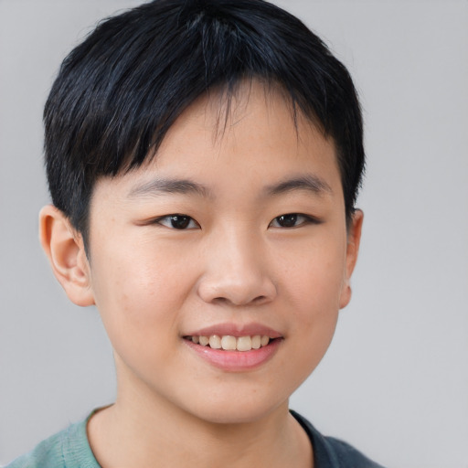 Joyful asian child female with short  brown hair and brown eyes