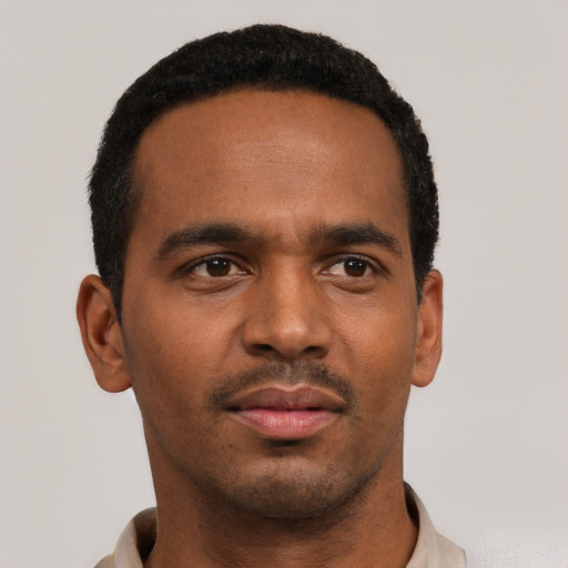 Neutral black young-adult male with short  black hair and brown eyes