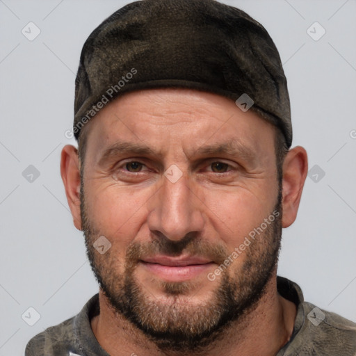 Joyful white adult male with short  brown hair and grey eyes