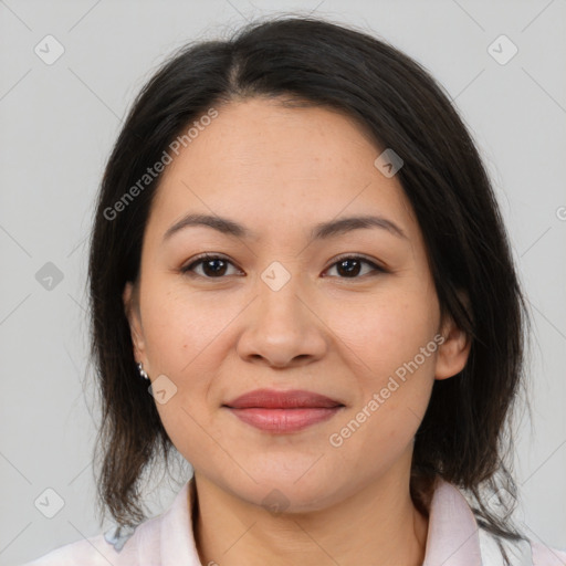 Joyful asian young-adult female with medium  brown hair and brown eyes