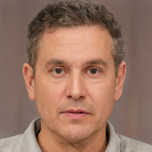 Neutral white adult male with short  brown hair and brown eyes