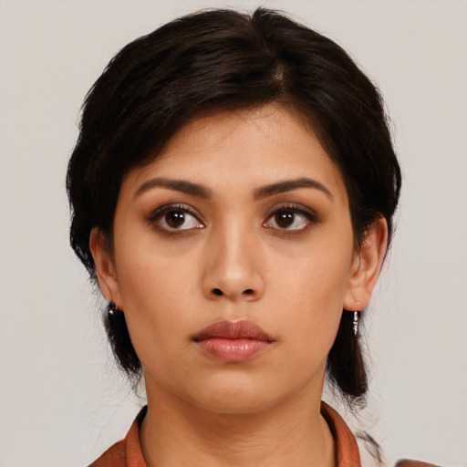 Neutral asian young-adult female with medium  black hair and brown eyes