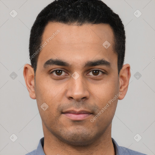 Neutral latino young-adult male with short  black hair and brown eyes