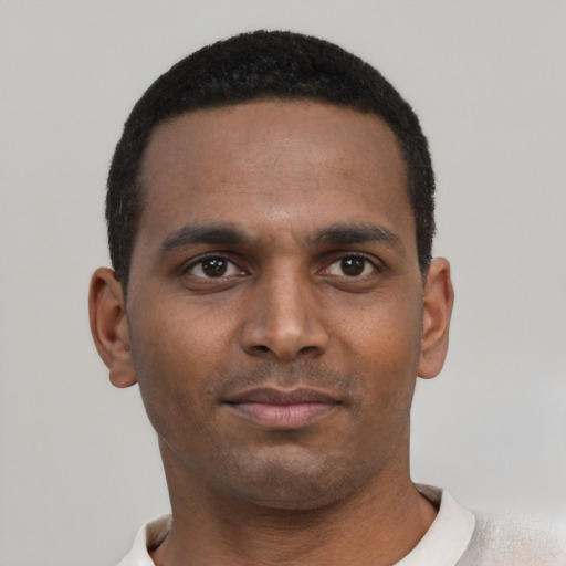 Neutral black young-adult male with short  black hair and brown eyes
